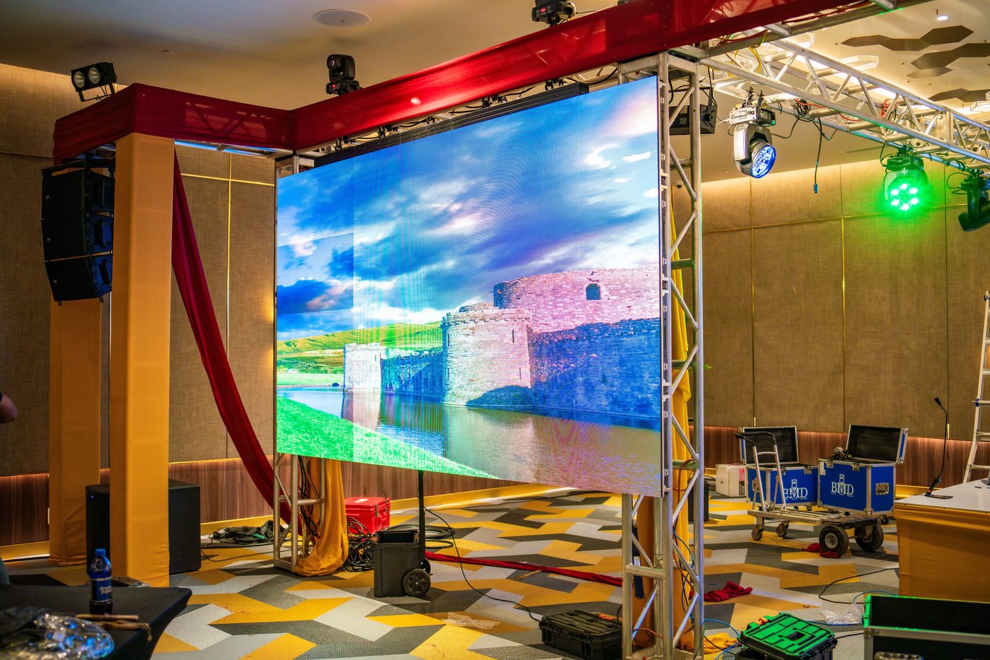 LED wall lit with content and the stage dressed